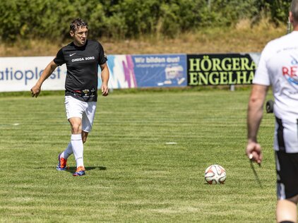 Spielszene Spieler mit Ball